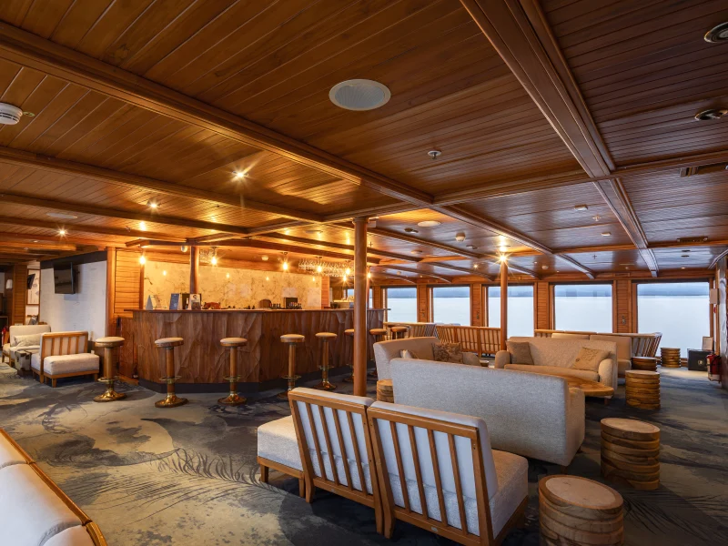 Charles Darwin panoramic lounge and bar aboard the Galápagos Legend